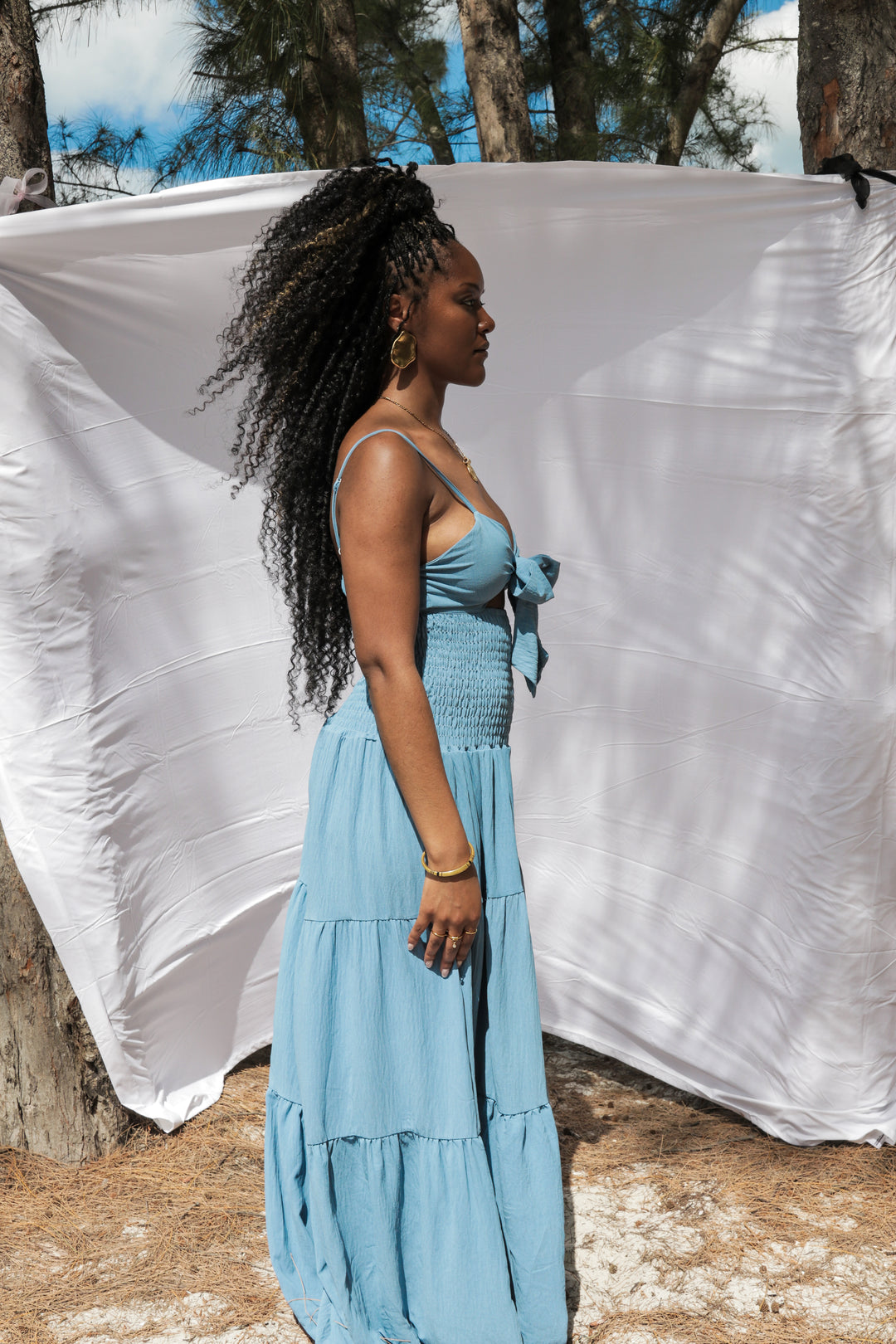 Yomi + Calendula Tiered Cut-Out Maxi Jumpsuit in Dusty Blue
