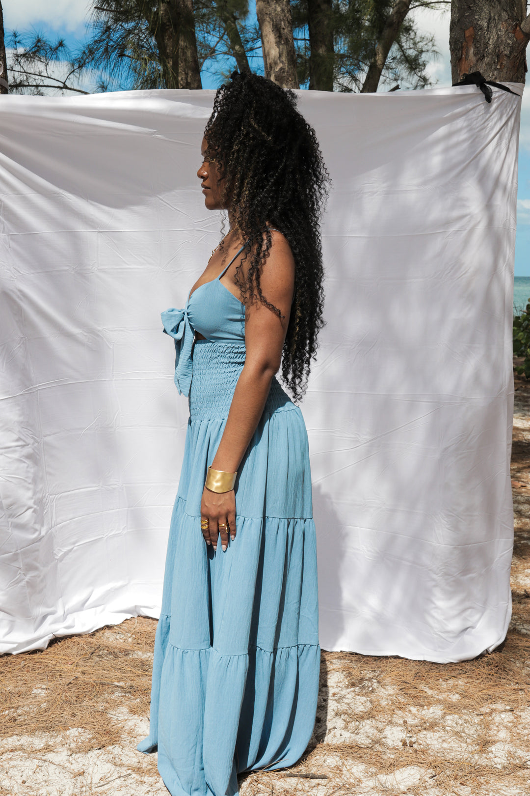 Yomi + Calendula Tiered Cut-Out Maxi Jumpsuit in Dusty Blue